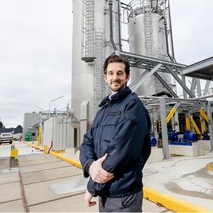 Engineer standing outside facility