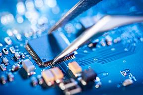 needlenosed pliers placing a microchip