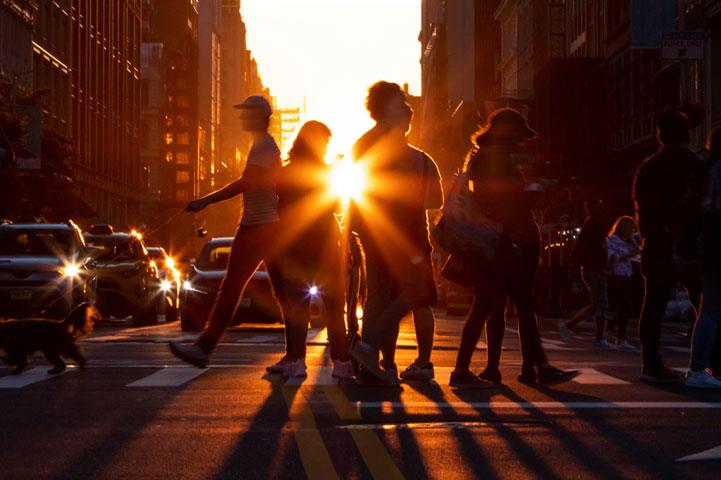 people walking in a crosswalk